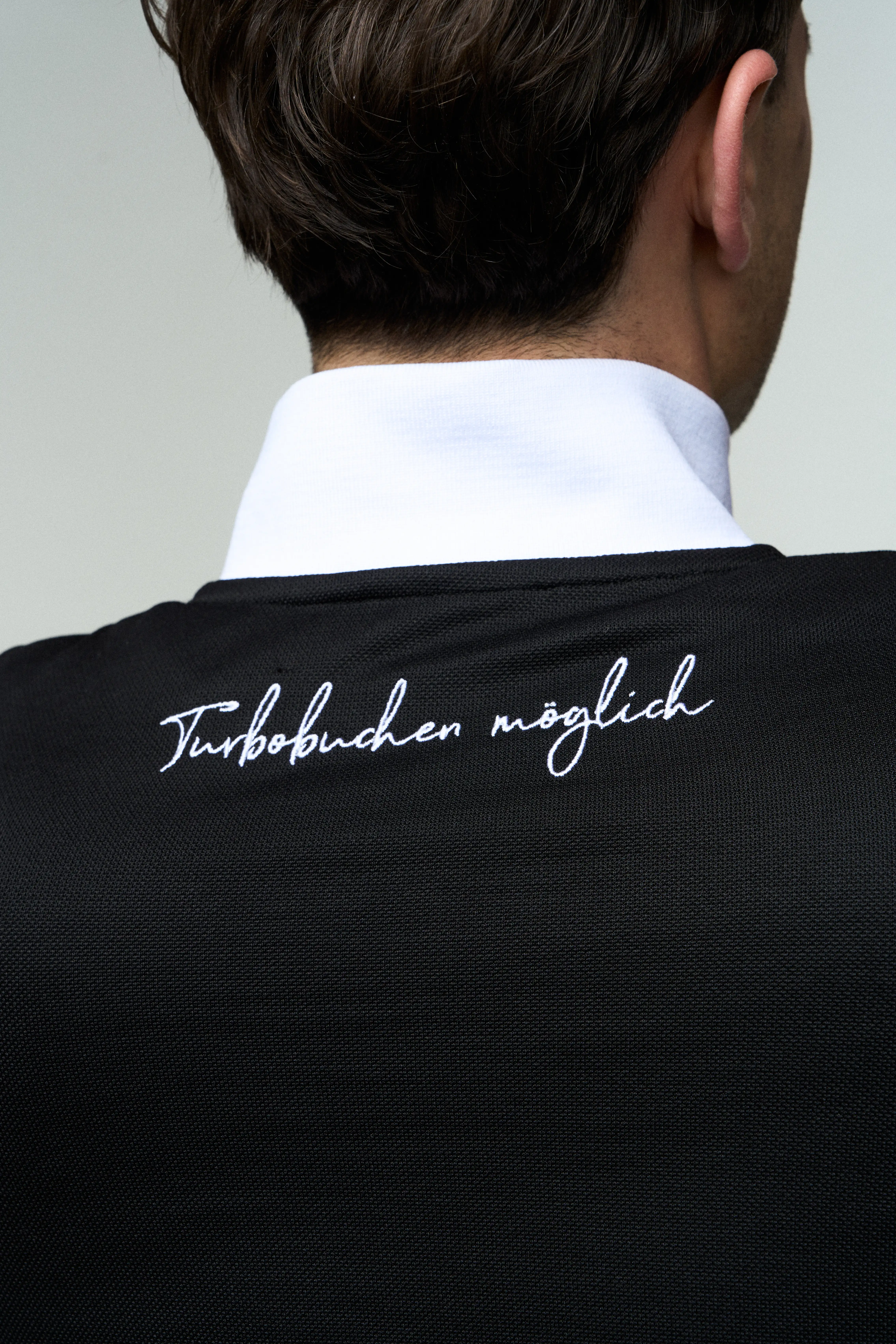 Detailansicht Nackenprint: MERKUR Trainingsjacke Sonne
